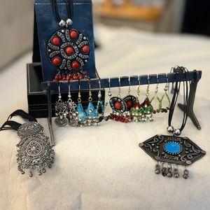 Package of 3 necklaces and 6 earrings. Never worn. All from India.